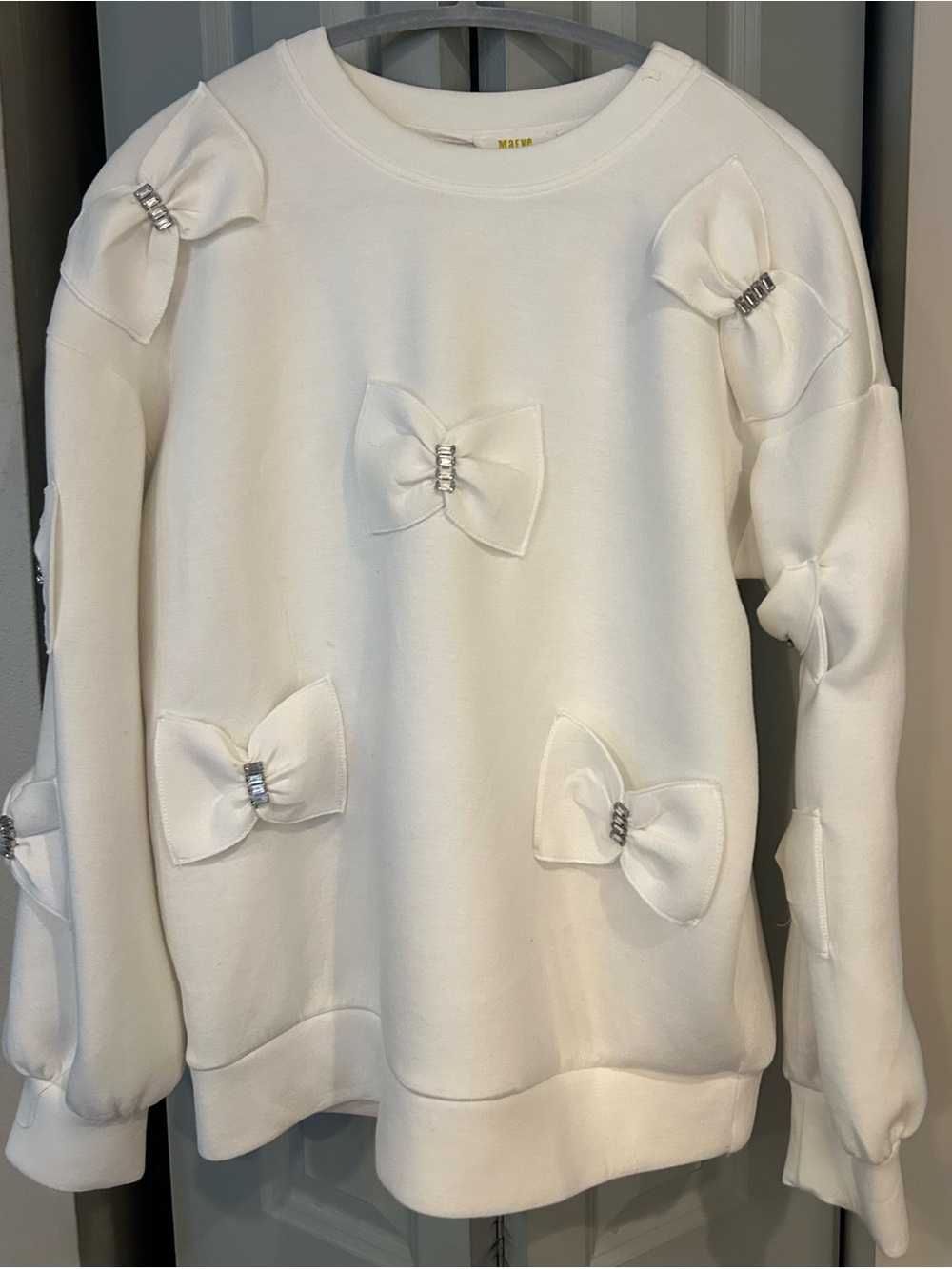 Anthropologie Cream Bow-Embellished Sweatshirt